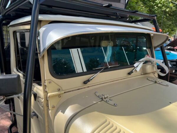 FJ40-45-HJ47-Solid-Sunvisor-sunshade-products-800x600 Toyota LandCruiser FJ40-45 HJ47 1967-1984 Solid Sunvisor All solid steel sunvisors come in a grey primer (ready for top coat) on top with green paint on the underside. If you know the paint code of your vehicle, we can provide a painting service for the top of the sunvisor. In the cart you can enter your paint code and a fee of approx $175 is added to paint the top of the sunvisor. All sunvisors come with an alloy front edge (covered in tape), you peel off the masking tape after the top coat paint has dried.