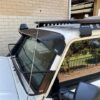 Toyota 70-79 Series Landcruiser (with factory snorkel) Black Windscreen Stone Guard and Mesh Sunvisor Bundl...