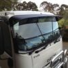 windscreenstonegprotectortruckadelaide_1_1 Isuzu FT -FV Series 2008on Black Mesh and solid Windscreen Sunvisor - Isuzu