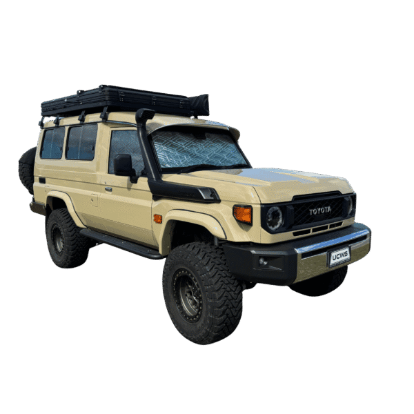 ToyotaTroopiewithUCWSSunshadesFront45VehicleImage-Edited.png Toyota Troop Carrier Front Cab Blackout Sunshade Kit - Sunshade